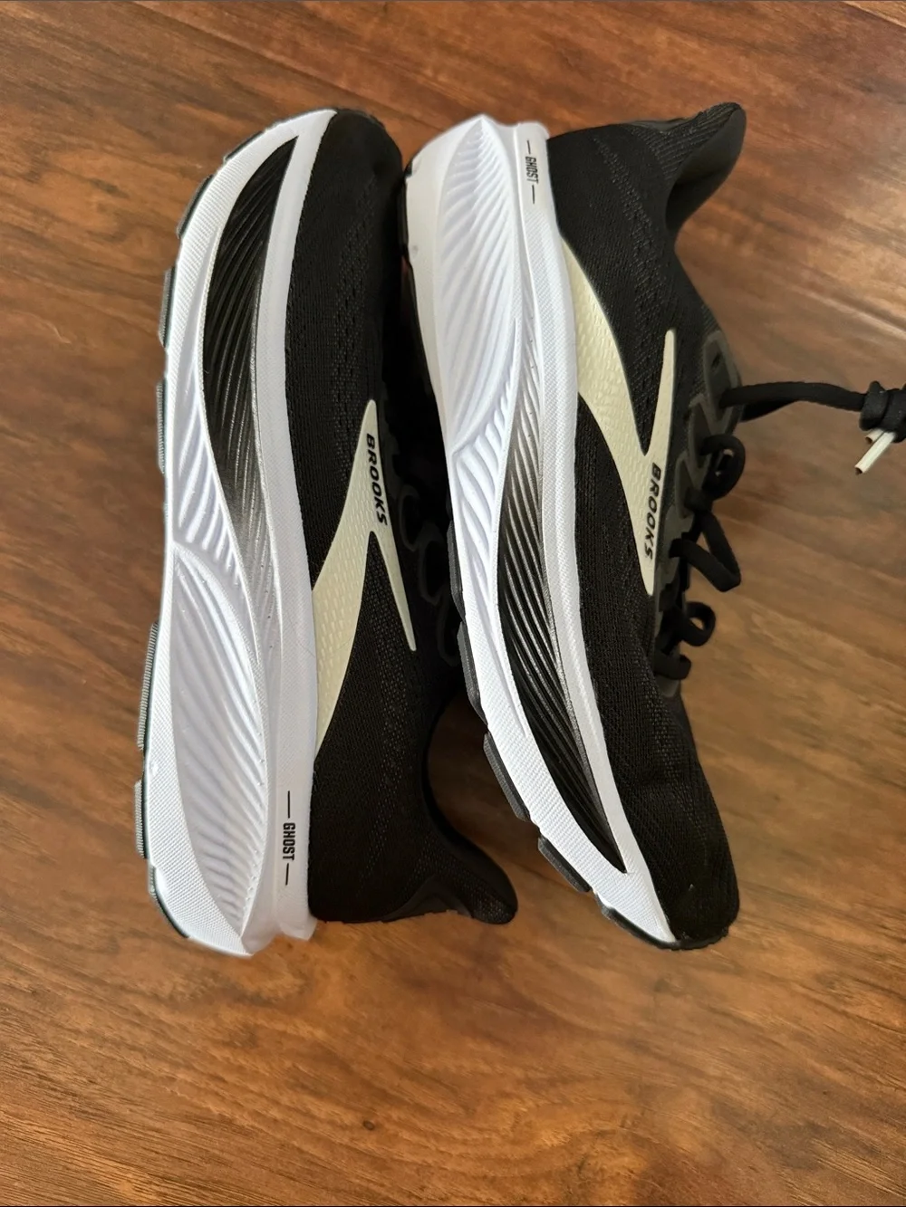 Black Athletic Running Shoes with White Midsole